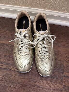 New Balance Metallic Gold Low-Top Sneakers